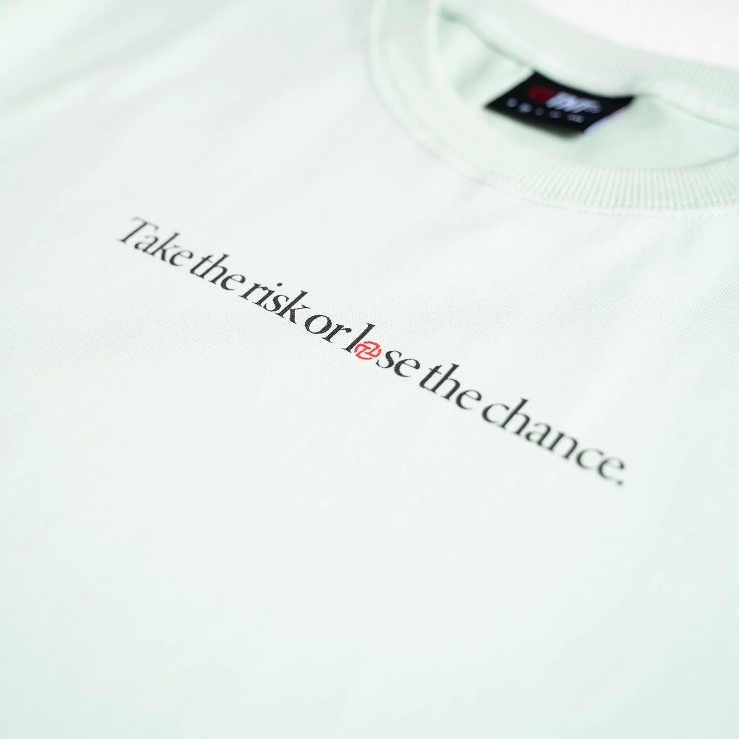 TNTCO : Risk Tee Merch